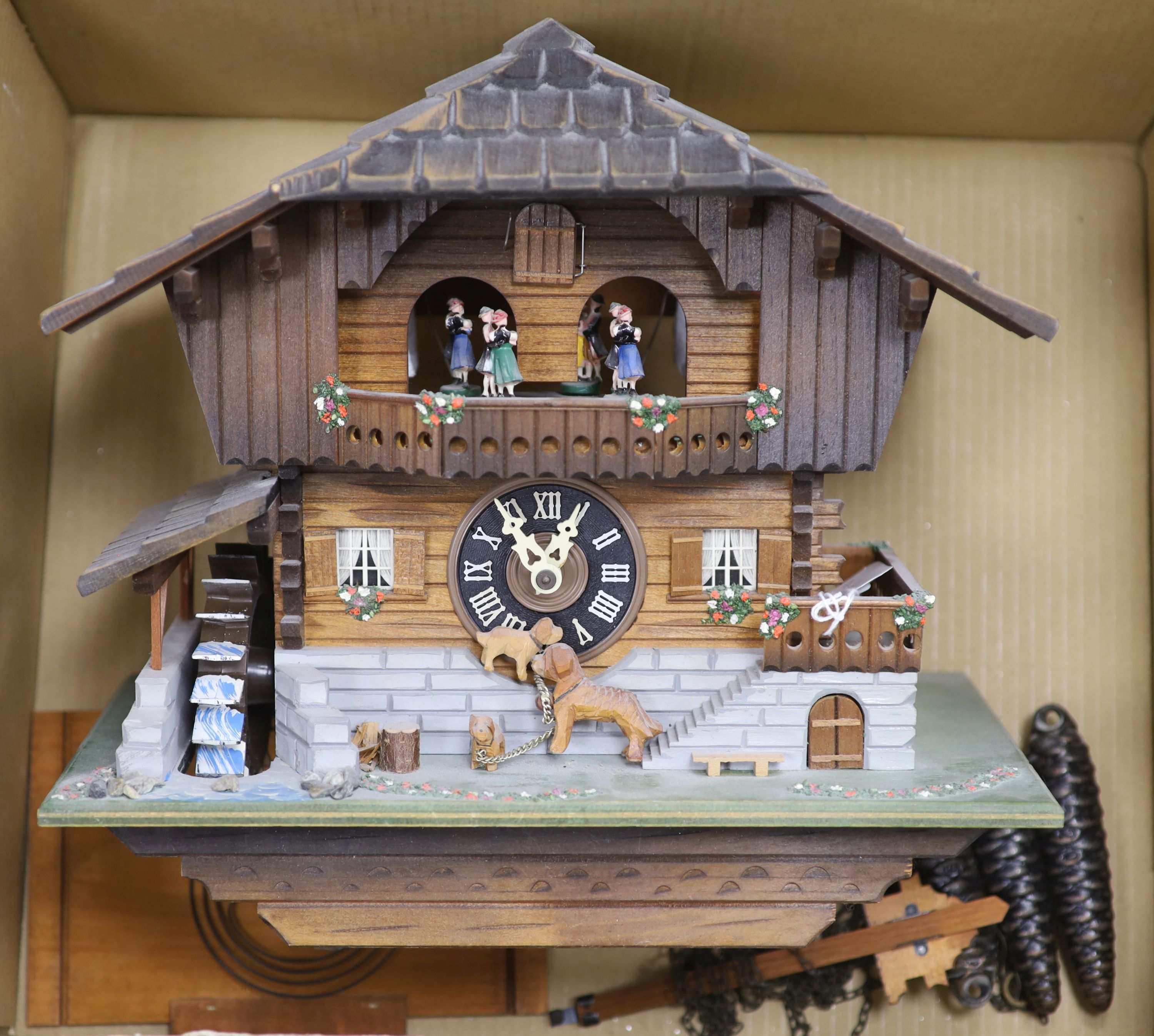 A modern Black Forest wall clock, height 32cm excluding pendulum